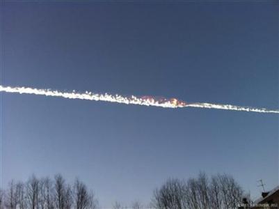 Trail of a falling object is seen above the Urals city of Chelyabinsk